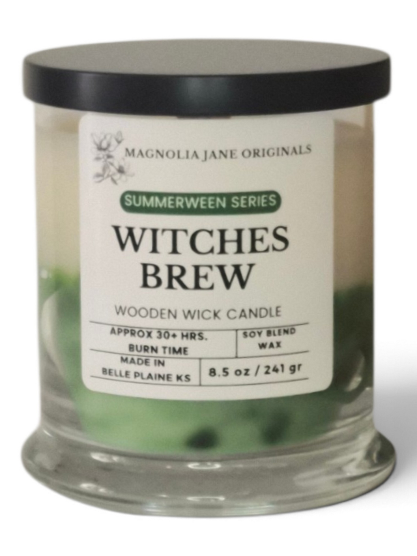 A 8.5 oz glass jar candle with a black lid and a white label reading 'MAGNOLIA JANE ORIGINALS SUMMERWEEN SERIES WITCHES BREW'.