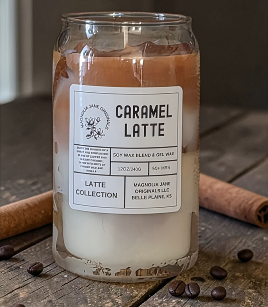A tall glass with gel wax that appear to look like ice cubes.  The cubes glow when lit. The top third of the candle is a creamy medium brown and the bottom 2/3 is a creamy white with a blend where they meet.