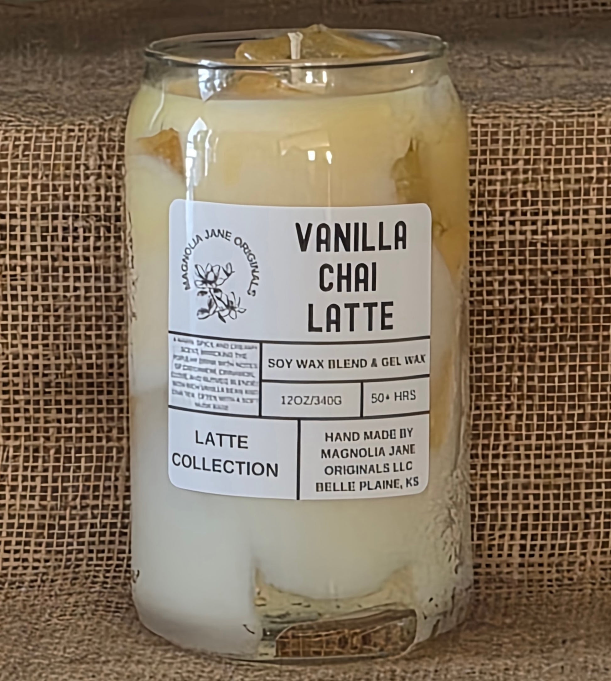 Embrace warmth and comfort with Vanilla Chai, a creamy candle that captures the essence of your favorite spiced tea latte. Aromatic black tea blends seamlessly with steamed vanilla milk and a whisper of vanilla syrup, creating a soothing fragrance that feels like a cozy embrace. The soft pale yellow and creamy white hues evoke the perfect cup, while innovative gel wax ice cubes add visual intrigue as they melt. Transform your space into a sanctuary of calm indulgence.